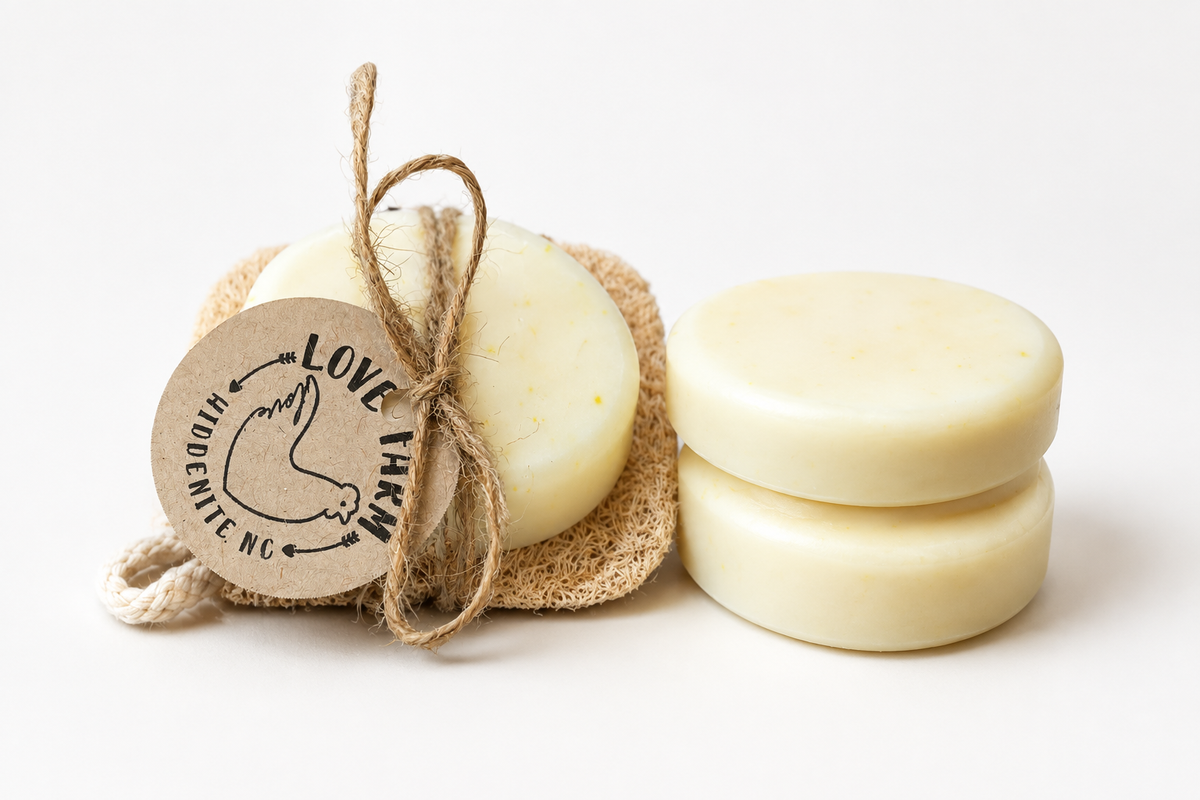 Love Farm soap bars arranged on a white background